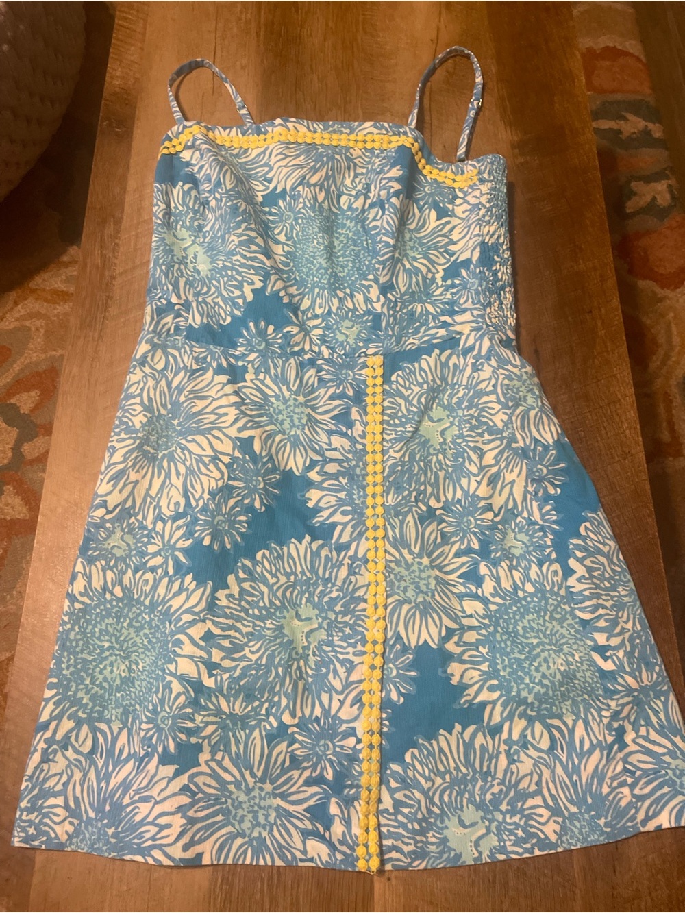 Lilly Pulitzer Aerial Blue “lion in the sun print” yellow trim Jesse romper.